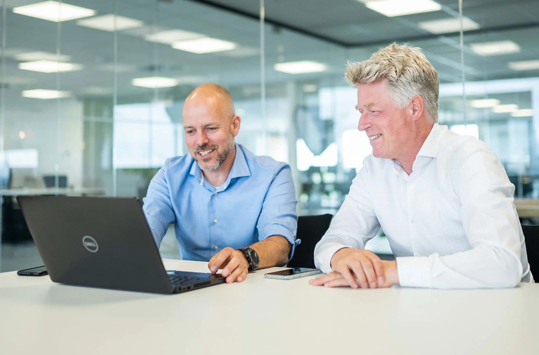 The Infoplaza team in a meeting